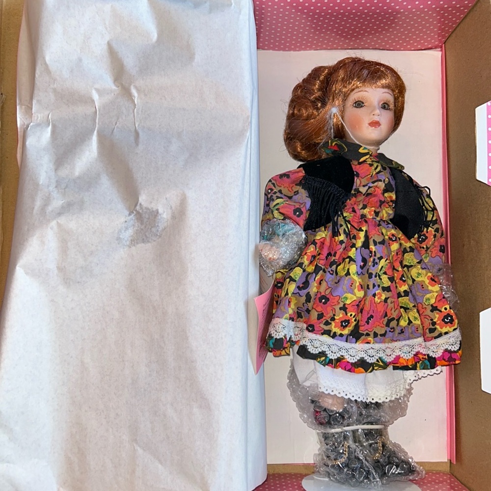 Paradise Galleries handcrafted authentic porcelain doll